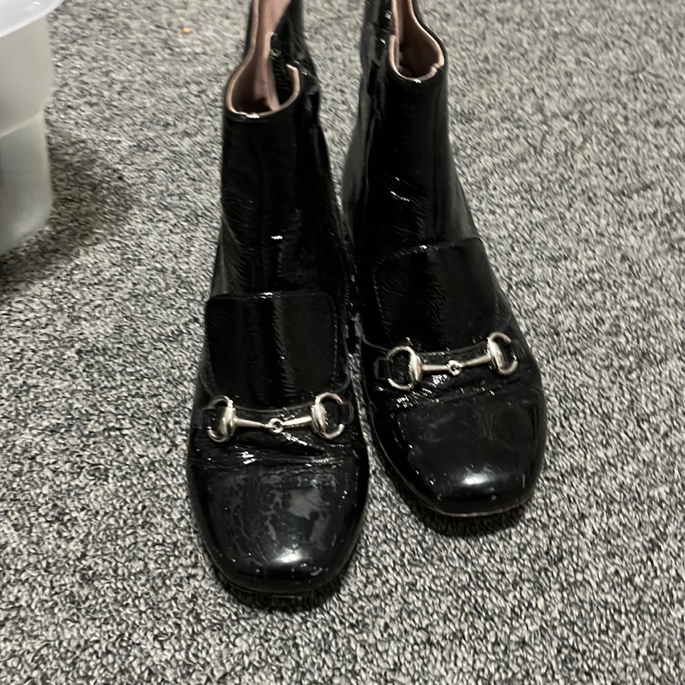 Black patent leather Gucci horsebit boot